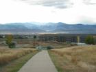 Overlloking Highlands Ranch, Colorado toward the Rocky Mountains. Many neighborhoods in Highlands Ranch have community trails such as this and many also have fantastic views of the front range.