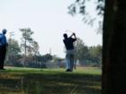Golfer takes proactice swing at the beautiful Pine Lakes Golf Course