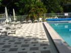 relaxing along the community pool near the gulf access canal, Lee County, FL