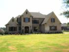 INCREDIBLE French country new home on a full acre; 5 bedrooms with 4 baths & 2 half baths.