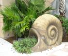 Isn't this adorable? It's a snail planter. It's about 5 feet tall! You can enjoy these when you stay at the Gaylord Palms Resort in Kissimmee. It's only 5 minutes from Disney World and many other area attractions!