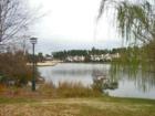 View from the pool house across the golf course - you can see the Villas that line the Preston golf course.