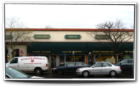 Storefronts on Chatsworth Ave. right near the train station.
