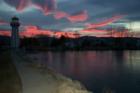 South Suburban Reno sunrise at Crystal Lakes Lighthouse with ice on the lake.