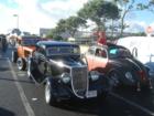 Classic cars are lining up to show off in the Mililani Christmas Parade