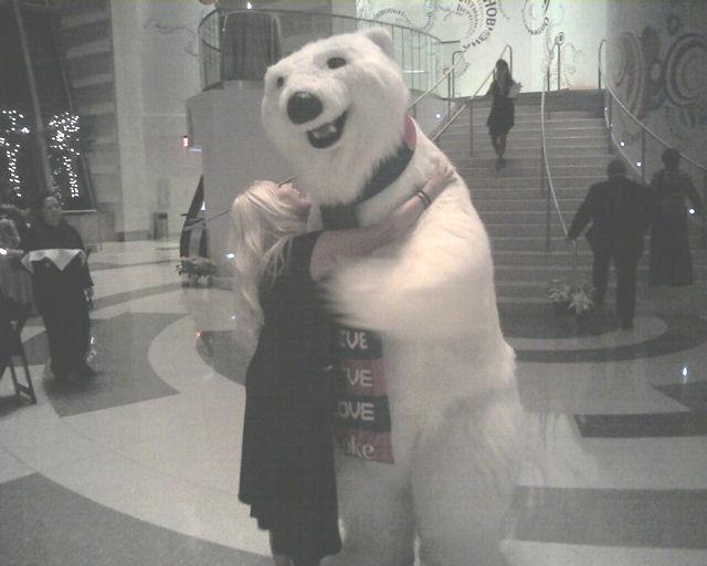 The Coca-Cola Polar Bear inside the World of Coke Museum in Atlanta, Georgia. Myra telling the bear she is from Alaska and him telling her he's from Marietta!