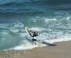 windsurfer launching at Hookipa Beach - Maui Hawaii - north shore of Maui
