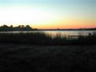 Sunrise on the lake 
      $389,000.
      1 Acre for Stick built House