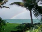 rainbow over the ocean in front of a spreckelsville home - maui homes for sale