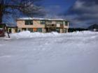 Winter view of the Island Store in LaPointe