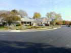 There are sidewalks on both sides of the street in Saratoga