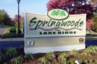 Entrance to Springwoods Apartments and condominiums on Springwoods Drive very close to Old Bridge
