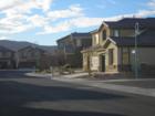 Rhodes Ranch is a guard gated golf community in the SW. Community amenities include walking paths, a water park and a recreation center.  