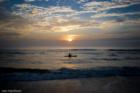 A lone kayaker welcomes sunris over the Atlantic, Flagler Beach, Fl. Photo by: Jon Hardison