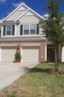 There are three townhome models in Oxford Chase. 1,720, 1,878 & 2063 sq ft. They ALL have 2 Car Garages!!!! This one is $237,500