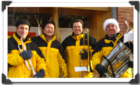 The TZBridgemen brass quartet playing in Scarsdale during the holiday season.
