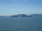 Alcatraz with Golden Gate Bridge in the background.
