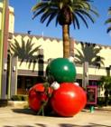 Christmas in down town Brea on Birch St. Giant holiday ornaments displayed around town. Photo by Lynda Eisenmann