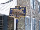 This sign is located in Rhinebeck next to the post office and Beekman Arms