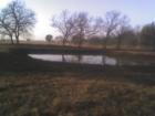 Pond and raised pad on small ranch in Alum Creek area