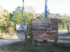 Entry to riding trails in McKinney Roughs off of Pope's Bend in the Lost Pines area of Cedar Creek, Bastrop County, Texas
