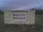 Entry to Martins Meadow off of Hwy 21 in Cedar Creek Texas