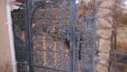 Ornate Gate to Enclose Stone Patio of A French Country home