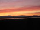 Another sun sets behind the Islands.