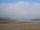 Fog rolling in over the Batiquitos Lagoon in South Carlsbad, a common sight.