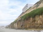 Eroding bluffs along the beach in Encinitas at Moonlight Beach