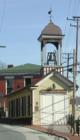 This is a close-up shot of the Bell Tower for the Firehouse Museum in Ellicott City.
