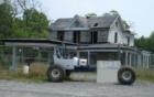 Is it the house or the buggy for sale?  Old store on Gunston Road in Lorton VA
      ©Cindy Jones