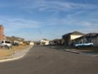 Residential street in Hunters Crossing, Bastrop, TX