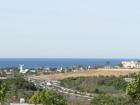 Winter view of the ocean, the Carlsbad windmill, and the flowerfields from Cottage Row.