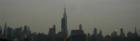 View of the Manhattan skyline from New Jersey as you are about to enter the Lincoln Tunnel.  It was a really gray day!