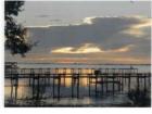 This is a photo taken from Soundside Drive in Gulf Breeze across the Santa Rosa Sound toward the National Seashore.