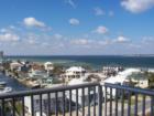 A Balcony View from the new Emerald Dolphin Condo on Pensacola Beach. From the Emerald Dolphin Balconies you have a view of the Gulf of Mexico and the Santa Rosa Sound. The sunsets are spectacular!