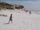 Frisbee on the white sand of Pensacola Beach