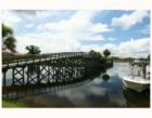 The wooden bridge from # 18 hole on golf course to club at WCI's Waterlefe Golf and River Club