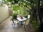 A typical yard at a River Park townhouse.