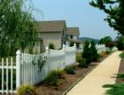 Landscaped sidewalks line the streets in Village of Arcadian Springs