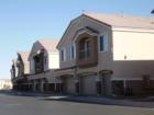 North Valley Court is a gated town home community located near Aliante and 215.  Community amenities include a pool.