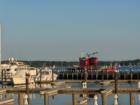 Tug boat in Greenport Marina.  Walk along the board walks in Mitchell Park and explore the shops, sit on the beach or participate in the many park events.