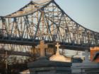 Cemetary in Algiers Point, with the Crescent City Connection in the background