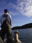 Captain Jack and his pet human, Reed scoping out the best spots for trout fishing along the Morgan River in Beaufort SC