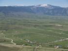 Overhead view of the Snickers Soccer Tournament in Big Horn, Wyoming with the Big Horn Mountains in the background.
      Photo by John Chase