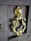 Detail of door knocker on Warwick Road home.