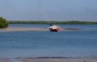Sailboat reting on the water on the bay side of Lover's Key