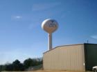 Water tower that shows the Lindale Eagle mascot.  This photo is taking just behind the high school.