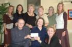 Katy couple Jim & Kathy Darby receiving a $1,000 check from Liz Carter & Team Realty. "It was a contest, but mainly I  wanted to say thanks for all the support I get from my 3,000 loyal past clients."